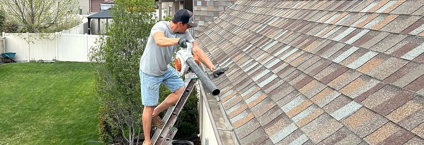 gutter cleaning using leaf blower
